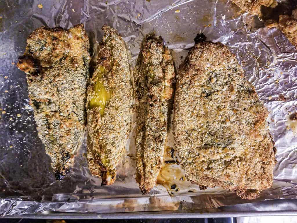 baked chile rellenos on a pan