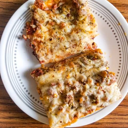 sausage pizza on a plate