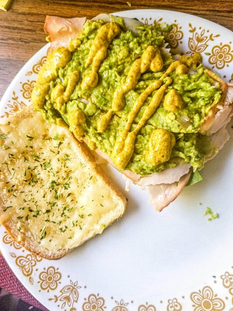 subway ultimate garlic cheesy bread with toppings.