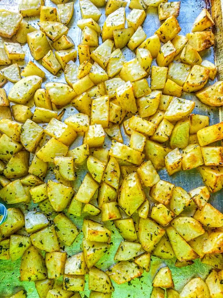 breakfast potato cubes on a baking sheet