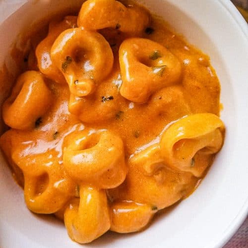 tomato soup with tortellini in a bowl