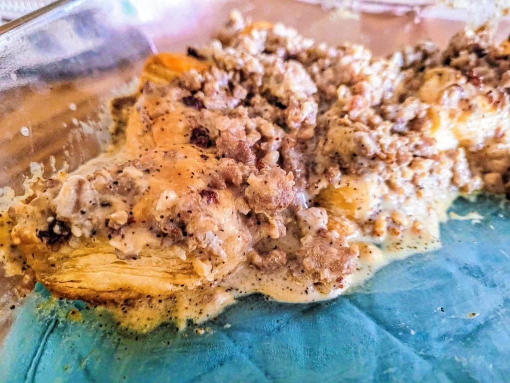 biscuits and gravy in a glass pan. 