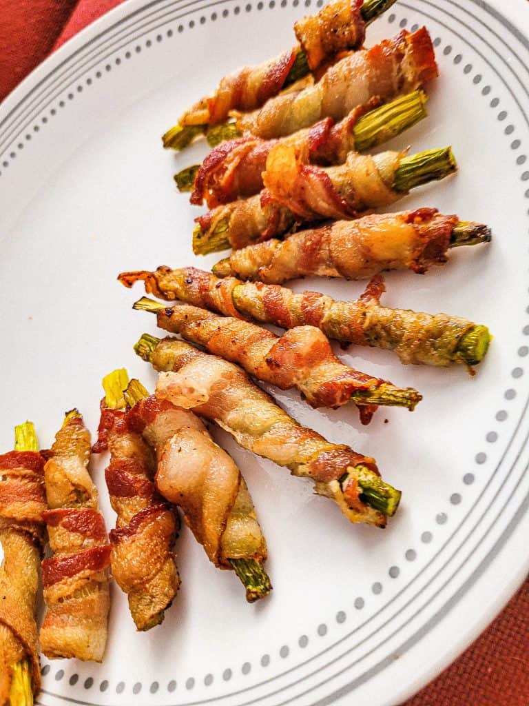 air fryer bacon wrapped asparagus on a plate