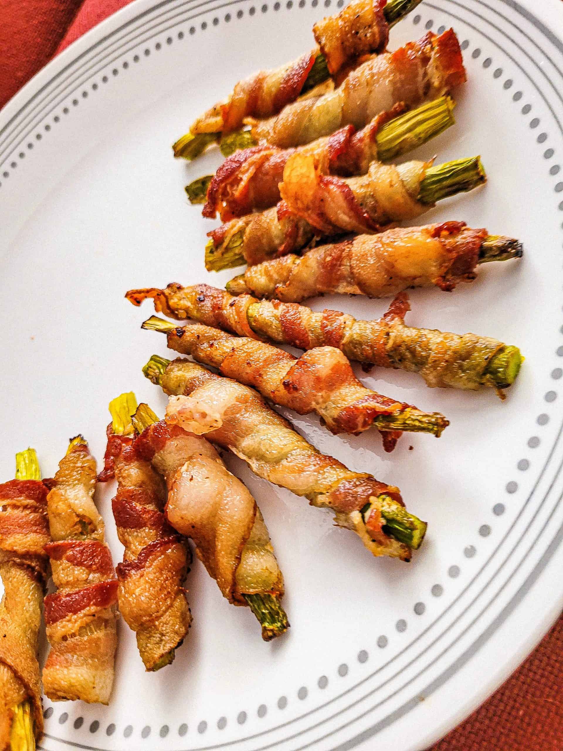 bacon wrapped asparagus on a plate
