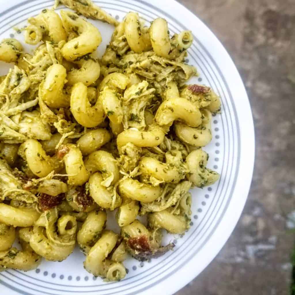 pesto chicken pasta on a plate.