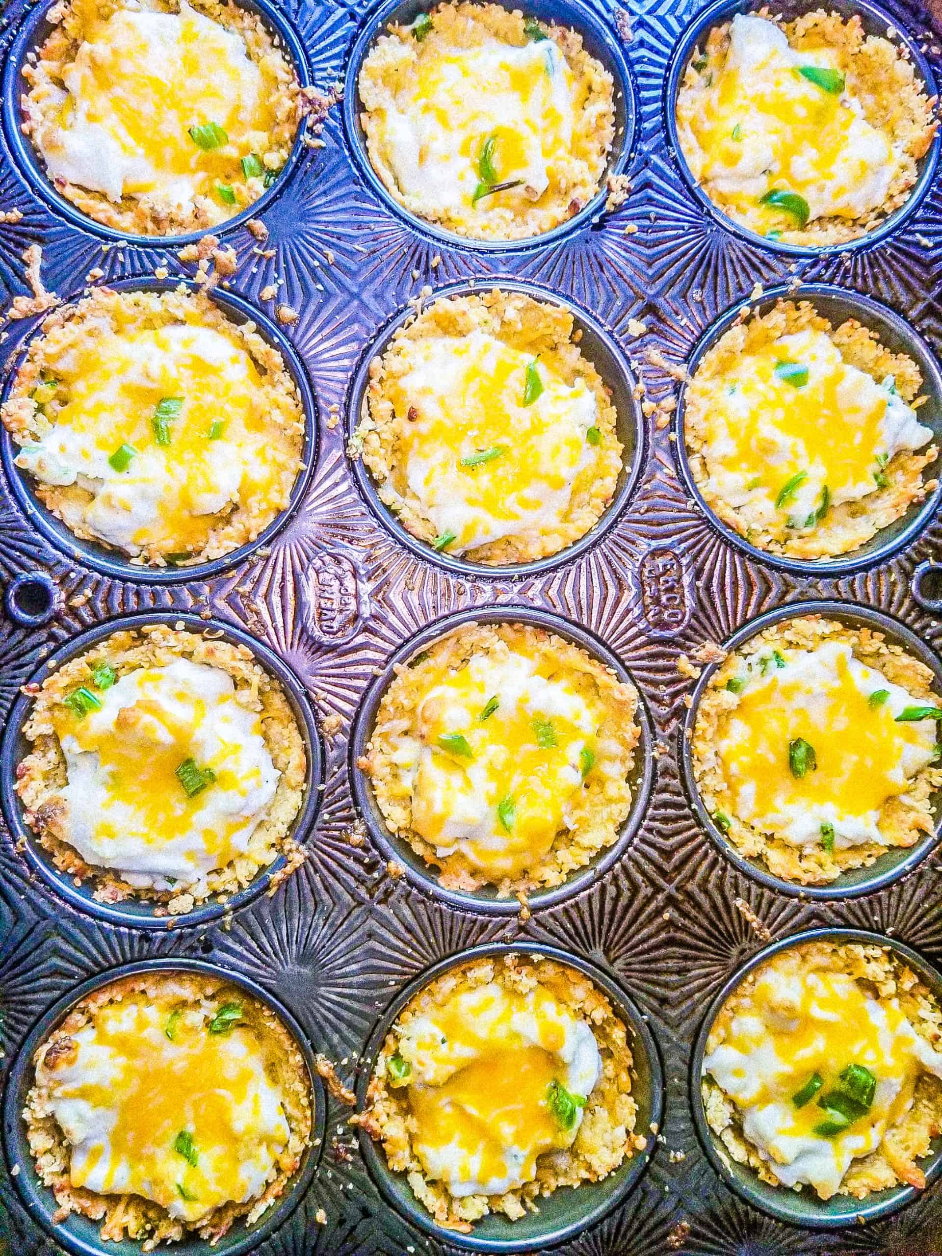 jalapeno popper cups in a muffin tin
