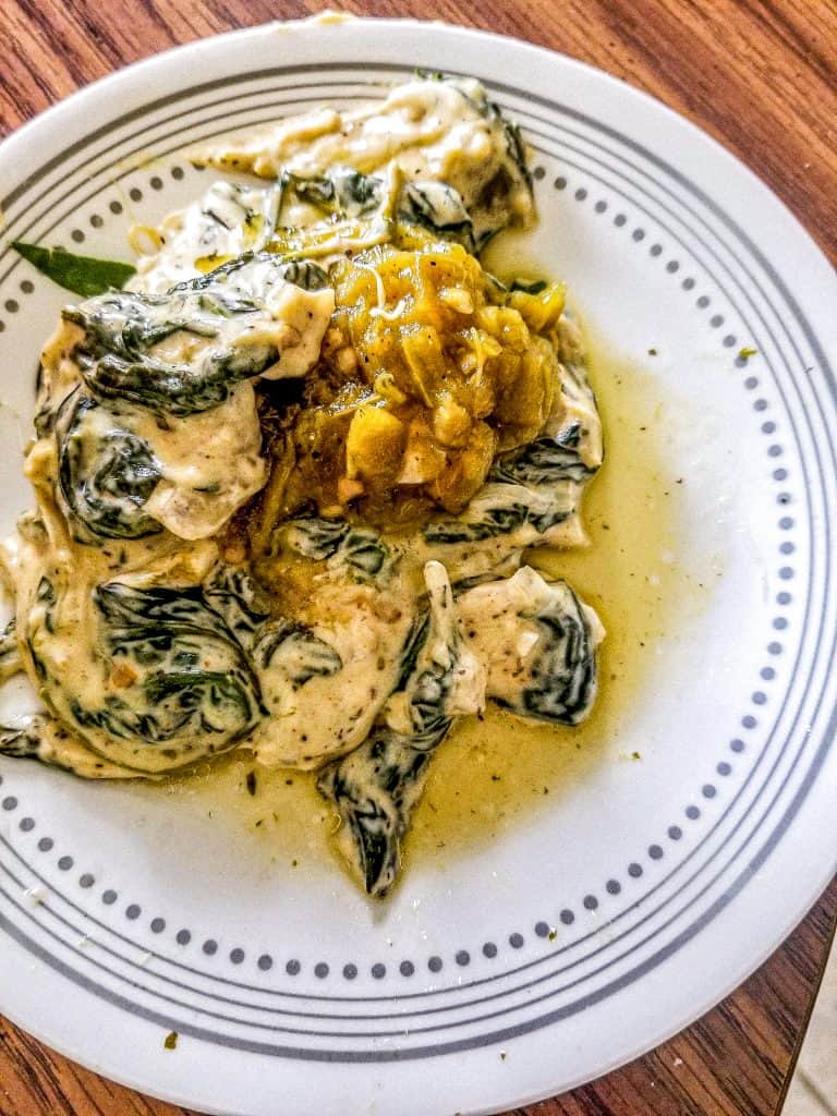stovetop spinach and artichoke dip without mayo on a plate.