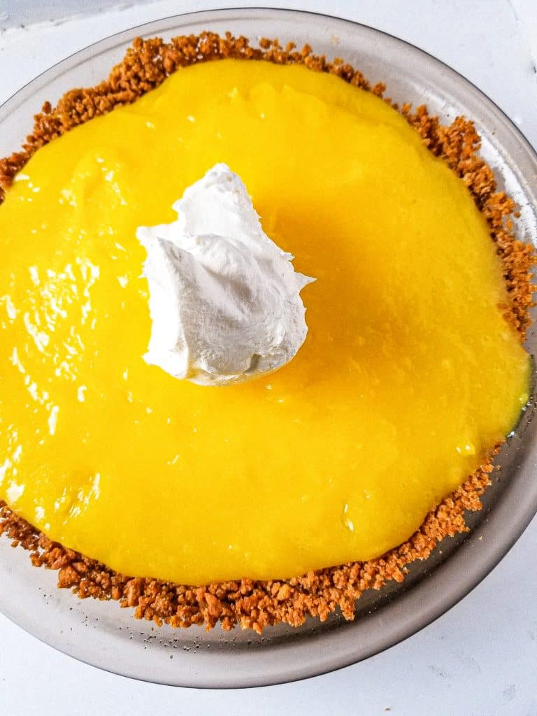 easy lemon pudding pie in a glass pie dish. 