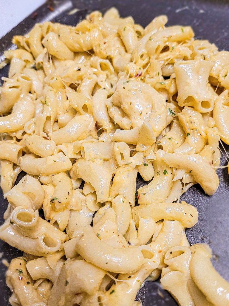 3 cheese mac and cheese without milk on a frying pan.