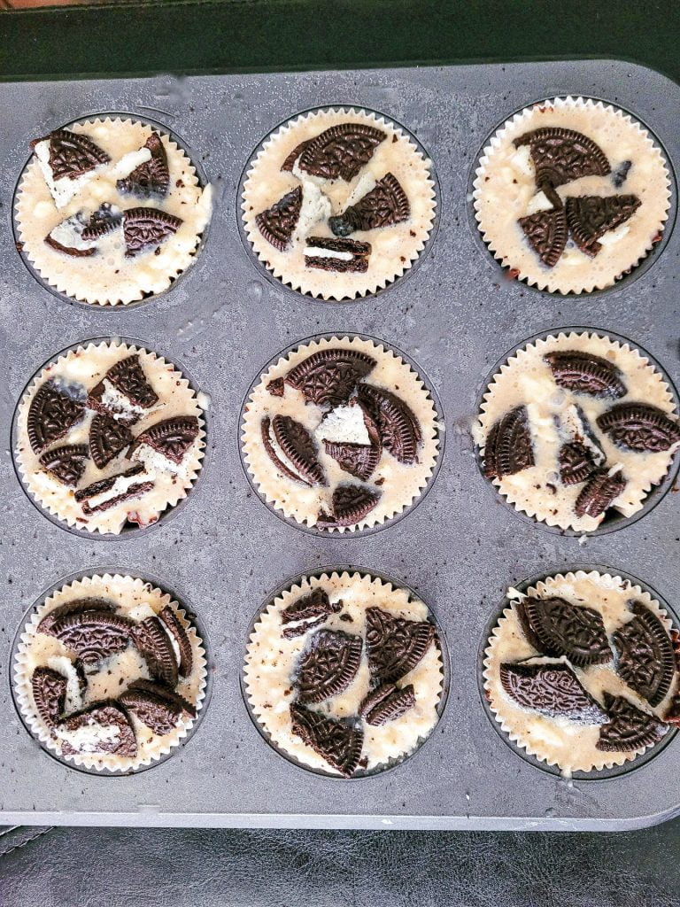 oreo cheese cake ups top view in cupcake pan.