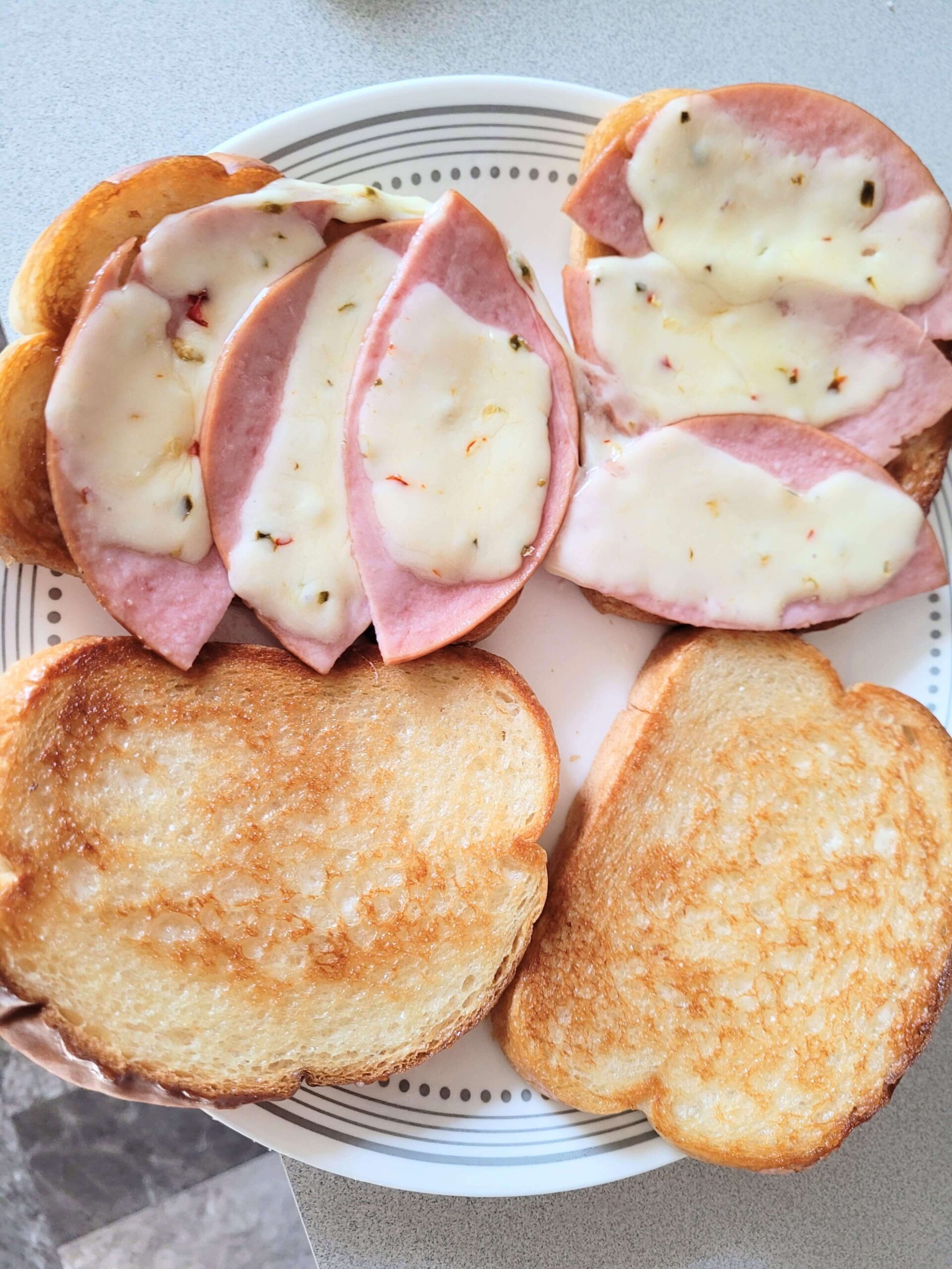 pig each sandwich open face on a plate with bread