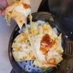 Cheese pull with salsa in air fryer.
