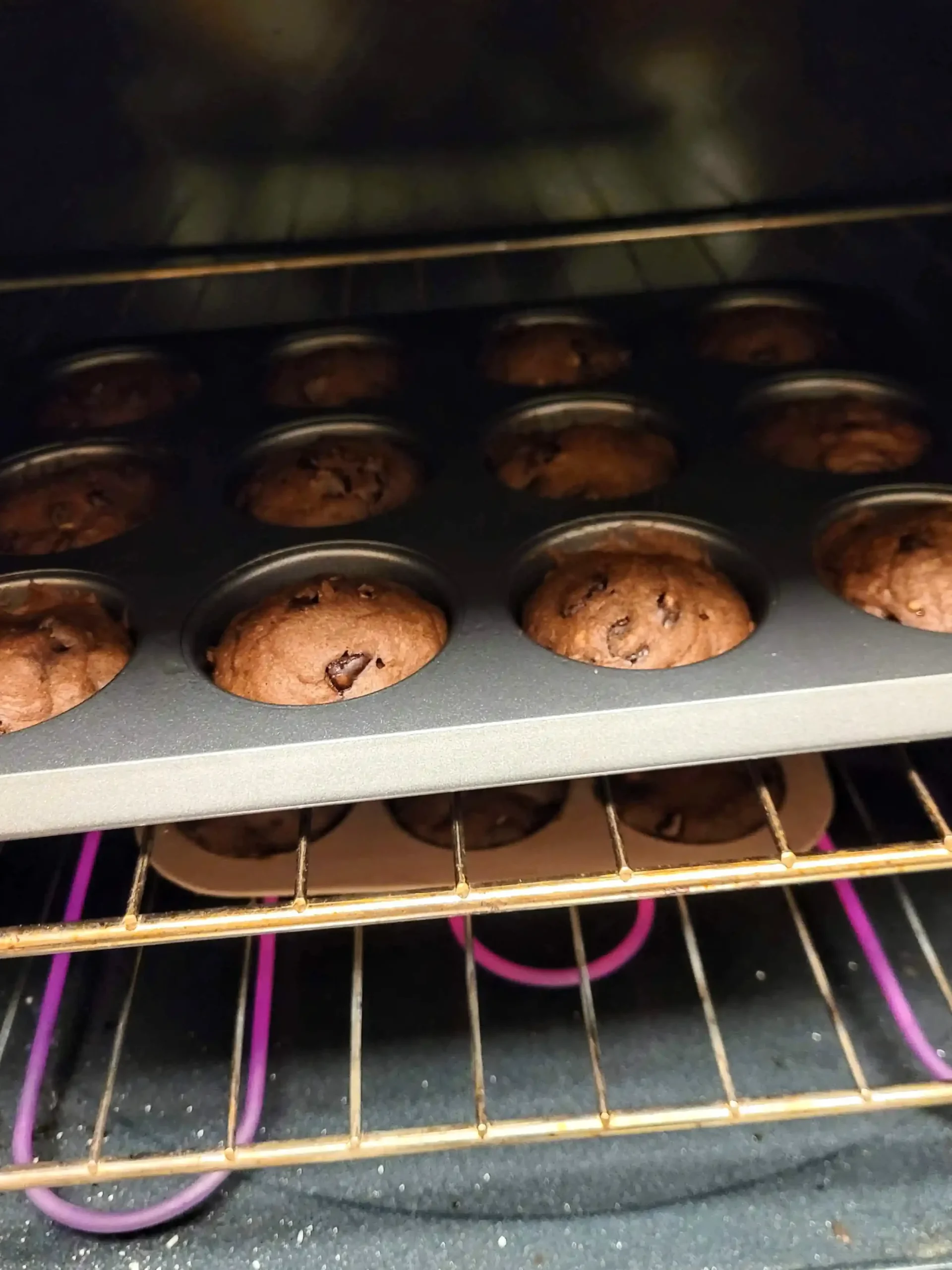 double fudge banana muffins cooking in oven.