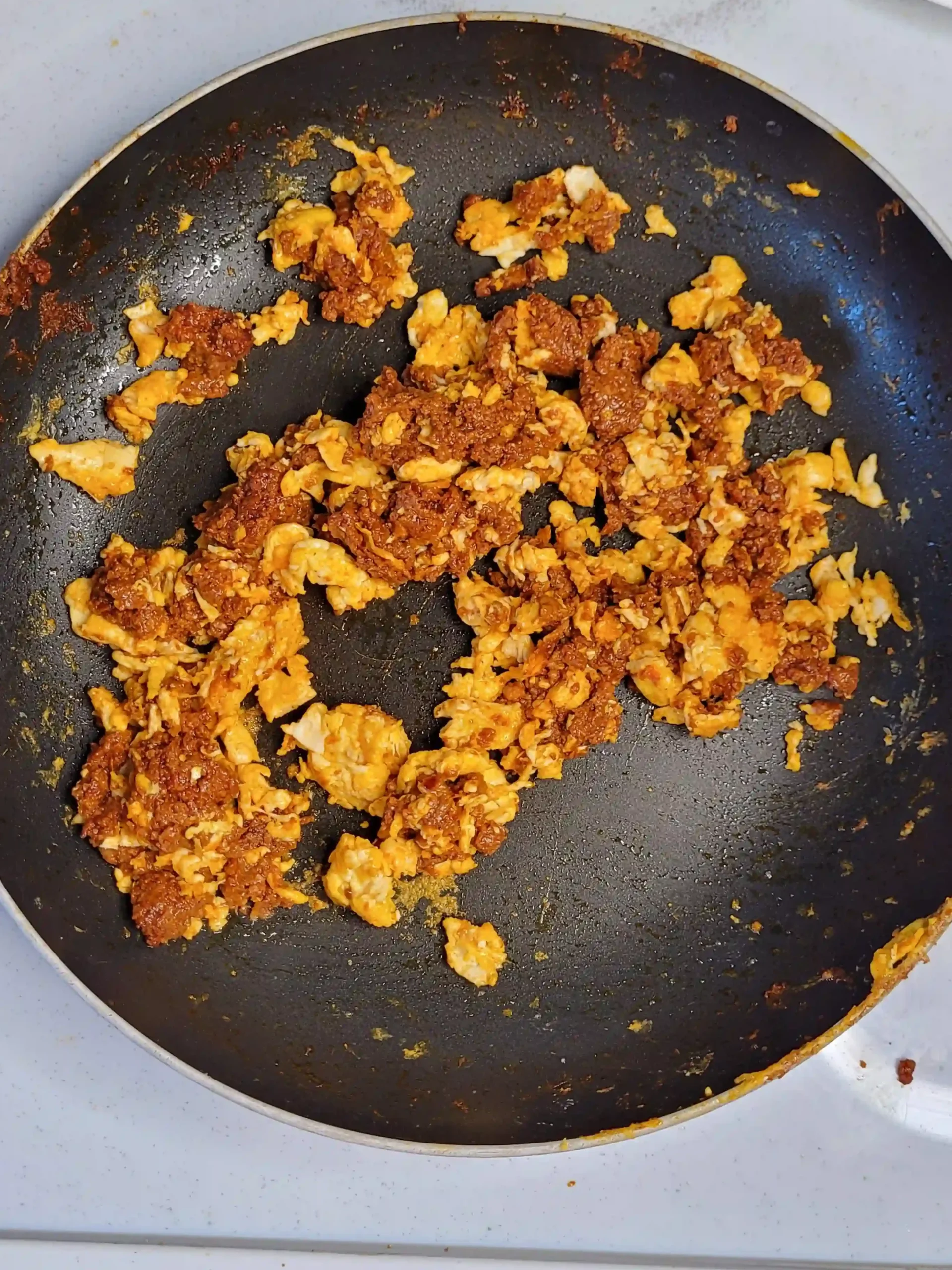 chorizo and egg taco mixture in skillet.