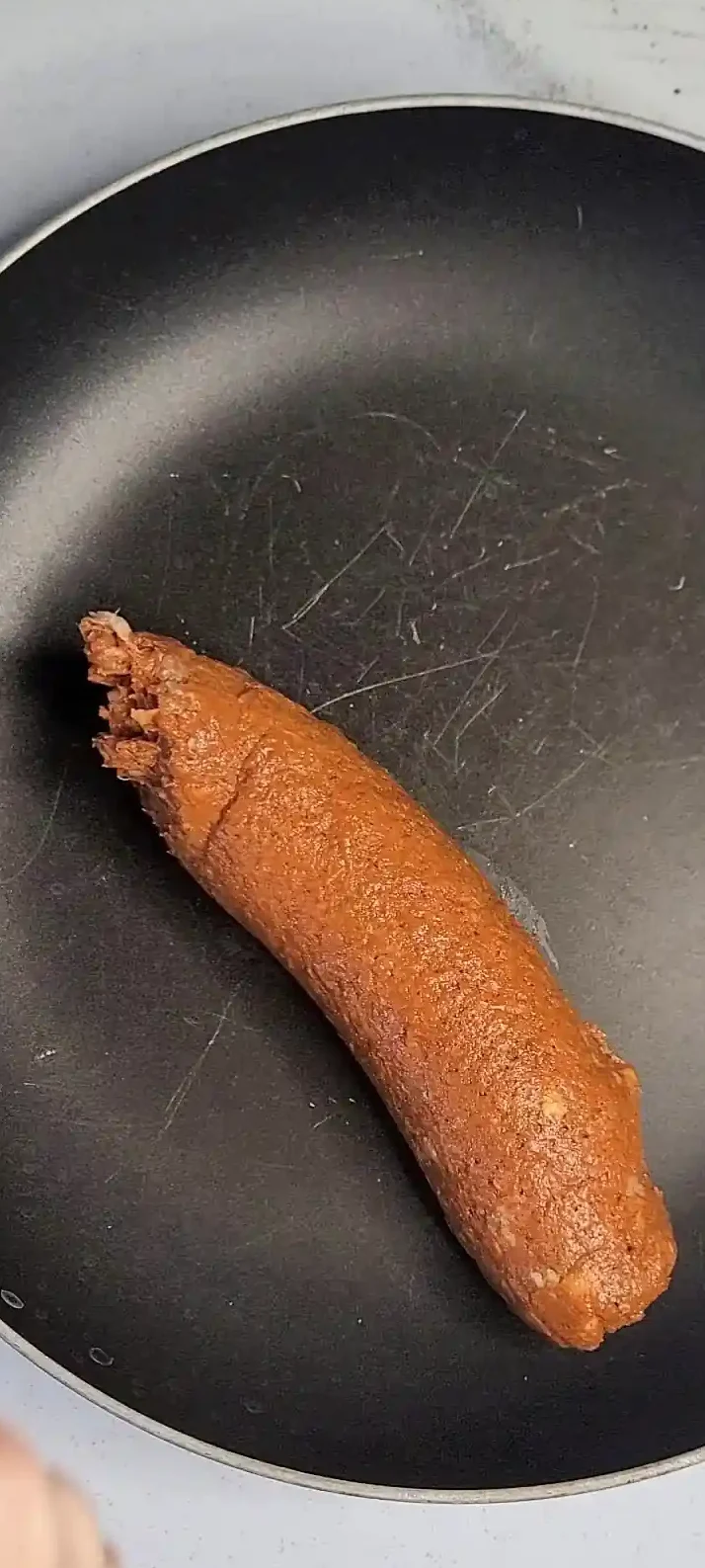 chorizo from a tube in the skillet
