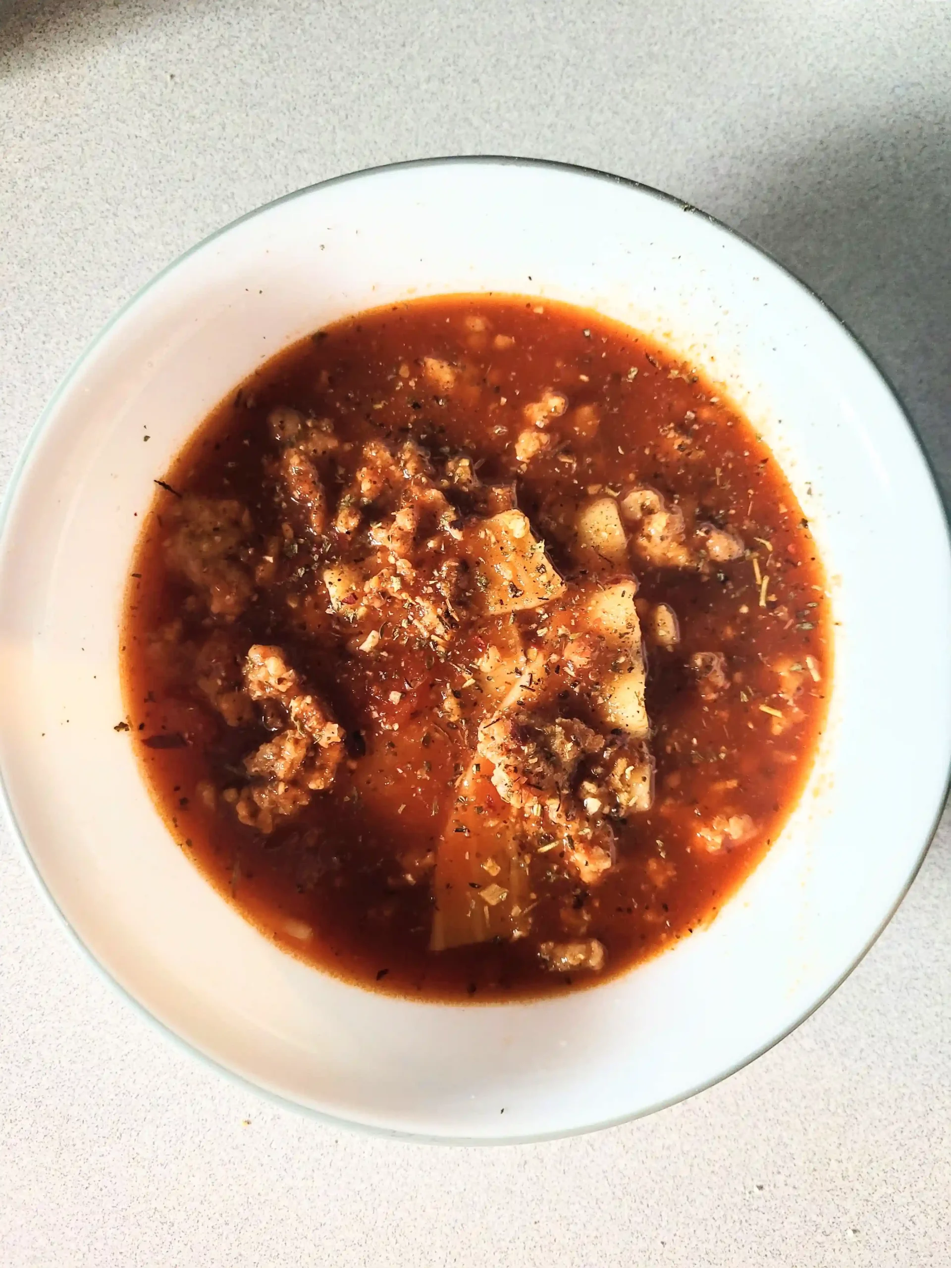 Lasagna soup top view without cheese.